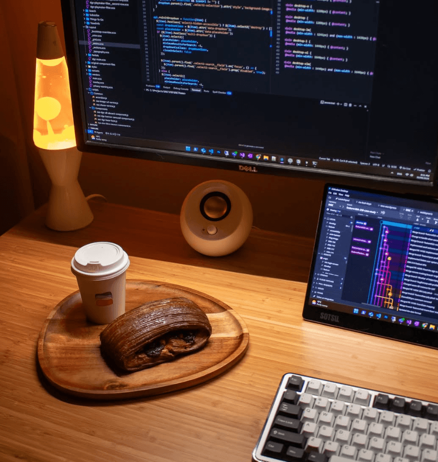 Curated home office setup with desk, monitors, and productivity-focused gear